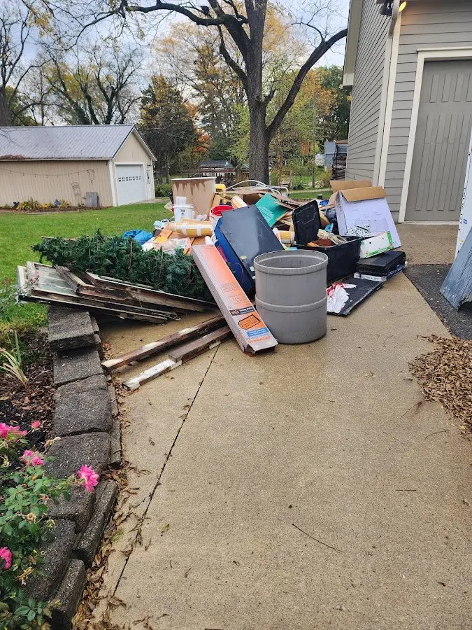 Dumpster being loaded with debris for 3 Yard Dumpster Rental in South Pasadena